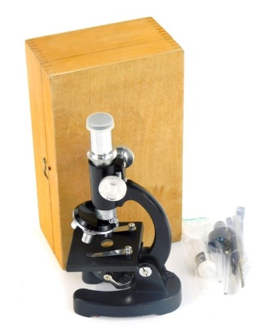 A Stein Student's microscope, in fitted box, with slides.