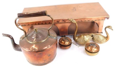 A 19thC copper plate warmer, with a fluted top, on rectangular base, with burners, 17cm high, 62cm wide, 24cm deep, a Victorian copper kettle, and two brass swans. (4)