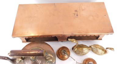 A 19thC copper plate warmer, with a fluted top, on rectangular base, with burners, 17cm high, 62cm wide, 24cm deep, a Victorian copper kettle, and two brass swans. (4) - 3