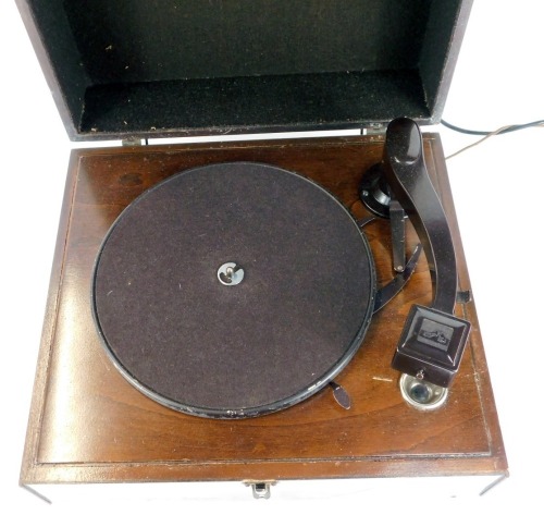 A His Masters Voice cased portable record player, 15cm high, 38cm wide, 35cm deep. WARNING! This lot contains untested or unsafe electrical items. It is supplied for scrap or re-conditioning only. TRADE ONLY
