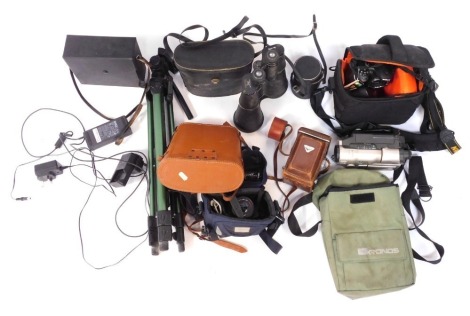 A group of camera and optics equipment, comprising a Canon Video Recorder, Tohyoh 30x70 binoculars, a Yashica Matt camera, Nikon V500 in carry case, Kronus binoculars, Panasonic DMC-GF5, a Yashica AF70-210 Macro lens, Mark Scheffe 32x50 binoculars, Telsta