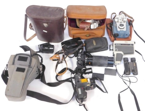 A group of camera equipment, comprising Samsung, Halina Super 8, Vivitar DVR 908M, Kodapak 126, Yashica 230-AF, modern binoculars stamped Made in China, Yashica FX-3 with Vivitar 75-300mm macro focusing zoom lens No 61161229, Kodak Instac, Solaros 16x60 b