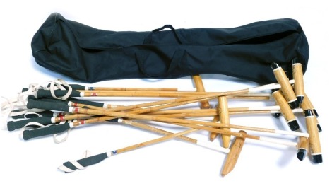 A group of Tocopilla of Argentina Polo mallets, comprising eight full length mallets and four practice mallets, in black carry case.