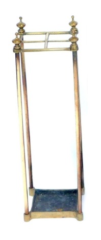 An early 20thC brass four sectional stick or umbrella stand, 61cm high, the top 19cm x 19cm.