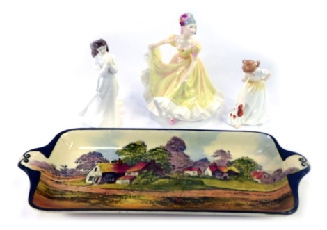 A Royal Doulton farming scene sandwich plate, 33cm wide, a Royal Doulton Pretty Ladies Ninette HN4717, 16cm high, Royal Doulton Sentiments Missing You HN4076, 15cm high, and Royal Doulton Sit HN3123, 11cm high. (4)