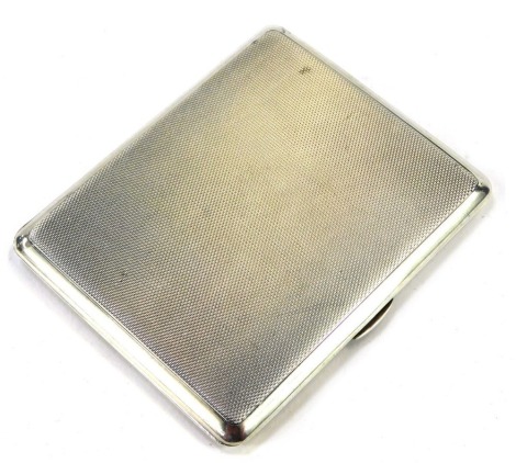 An Elizabeth II silver cigarette case, with engine turned decoration bearing internal inscription H M B 25.12.56, Sheffield 1955, 3.84oz.