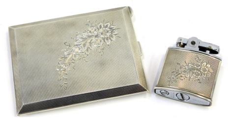 An Elizabeth II silver cigarette case and lighter set, the cigarette case with engine turned design with engraved floral spray, Walker & Hall, Birmingham 1960. 7.50oz gross. (2)