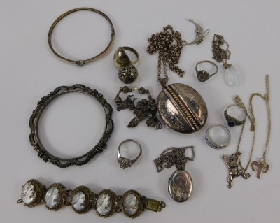 A group of silver and other jewellery, to include a Victorian silver locket, with applied and engraved detail, 5cm x 3.5cm, on curb link chain, 52cm long, a small group of silver dress rings, unmarked neck chains, mirror finish cameo bracelet, bangles, et - 2