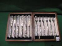 A cased set of 6 pairs of silver plated fish cutlery