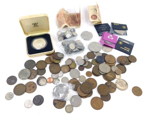 A Marie Theresa thaler 1780, Victorian and later silver threepence and sixpence coins, copper coinage, commemorative coins, etc., together with ten shilling notes. (a quantity)