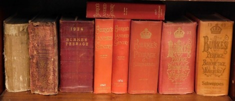 Nine copies of Burke's Peerage, Baronetage and Knightage, comprising 1932, 1934, The Tenth Edition, 1949, Burke's Landed Gentry 18th Edition, vol 1, 2 and 3, The Country Families of The United Kingdom 1879, and a Burke's 1904. (1 shelf)