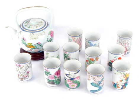 A Franklin porcelain collection Oriental beaker set, comprising eleven beakers and associated teapot on stand, with five boxes.