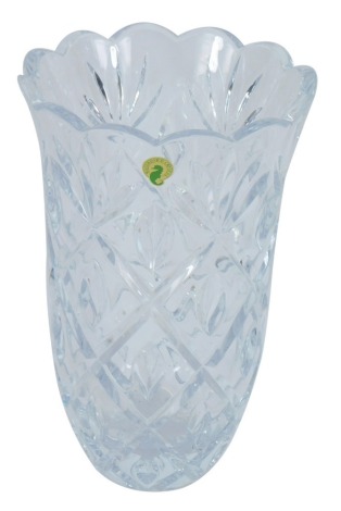 A Waterford Crystal cut glass vase, with a fluted top, with cross hatched floral fan design, 26cm high.