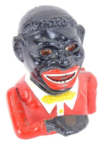 A reproduction money box, formed as a gentleman in red jacket, 16cm high.