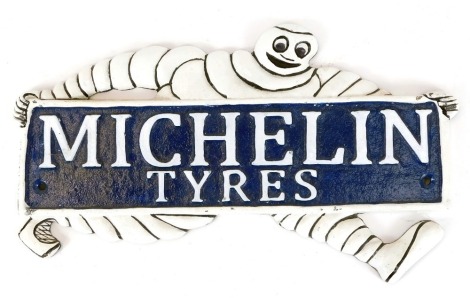 A Michelin Tyres cast iron advertising sign, 20cm high, 32cm wide.