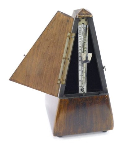 A Maelzel cased metronome, 23cm high.