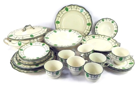 A Royal Doulton Countess pattern pottery part dinner and tea service, comprising seven tea cups, two soup bowls, one tureen and lid, six dinner plates, and various other plates. (AF)