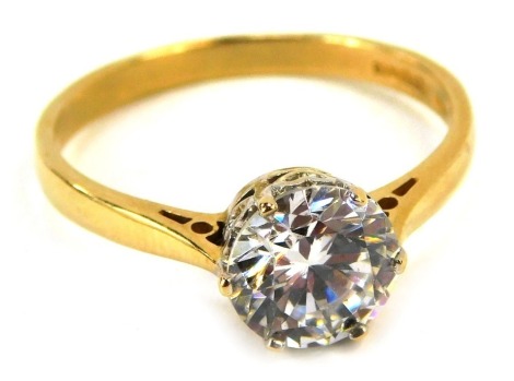 A dress ring, set with round brilliant cut cz, in a six claw setting, on a plain band, yellow metal stamped 585, ring size T, 3.5g all in. (boxed)