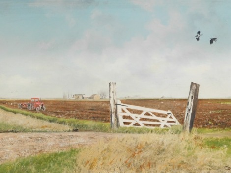 John Caesar Smith (b.1930). Lincolnshire Fenland landscape, with tractor ploughing the fields and Lapwings in the air, oil on canvas, signed, dated 72, 49.5cm x 75cm.