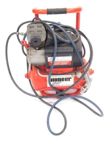 A Pioneer Air air compressor, in red, type MK105/10/075M.