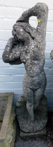 A reconstituted stone garden figure of the Birth of Venus, in arched pose emerging from a scallop shell, 112cm high.