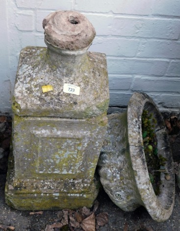 A reconstituted stone garden planter, with font bath, on a square set tapered base, 80cm high. (AF)