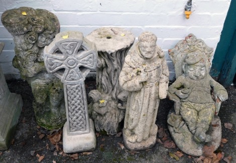 A group of reconstituted stone garden ornaments, to include Celtic cross, bird bath stand, cherubs, seated gnome, etc., the largest 70cm high. (5)