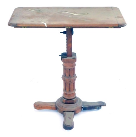 A Victorian mahogany draughtsman's table, with adjustable rectangular top, on a shaped and moulded four splayed base, 70cm high, 76cm wide, 40cm deep.