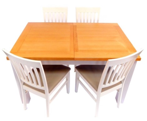 A light oak and grey painted draw leaf dining table, raised on square legs, 78cm high, 139cm wide, 208cm extended, 90cm deep, and a pair of similarly painted single dining chairs.