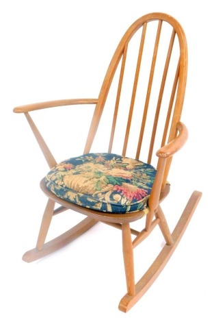 An Ercol model 428 ash and elm Windsor rocking chair, 61cm wide.