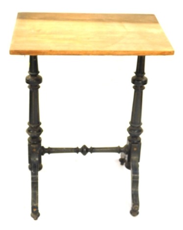 A Victorian ebonised occasional table, with a pine top, raised on fluted and turned columns over cabriole legs united by a turned stretcher, on ball feet, 75cm high, 57cm wide, 43cm deep.