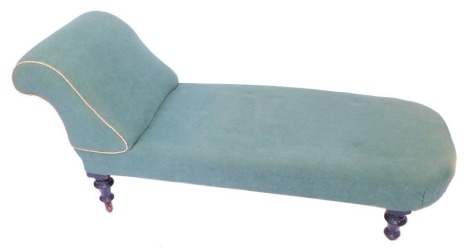 A Victorian mahogany chaise longue, upholstered in sea green fabric, raised on turned legs, on castors, 165cm wide.