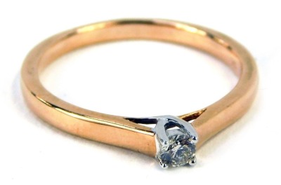 A 9ct rose gold diamond solitaire ring, with round brilliant cut stone totalling approximately 0.10ct, ring size N½, 2.2g all in.