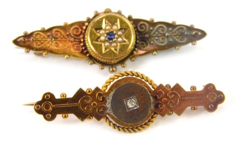 Two Victorian bar brooches, comprising one set with sapphire and seed pearl, with rubbed hall marks possibly marked 375, and another stamped 9ct with single stone, 3.5cm wide, 5.6g all in, in Cutt & Burchett of Oxford box.