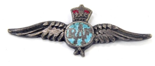 A silver RAF wings brooch, with central blue enamel with crown surmount, 3cm wide, lacking back, 2.5g all in. (AF)