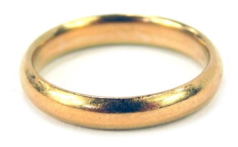 A 22ct gold wedding band, of plain design, Birmingham 1924, ring size L, 4.3g all in.