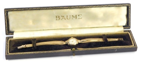 A 9ct gold Rodania lady's wristwatch, with a small silvered coloured watch head, with pierced and fan design bracelet, the watch head 1.5cm wide, the watch 19cm long, 15.7g all in, in a Baume box.