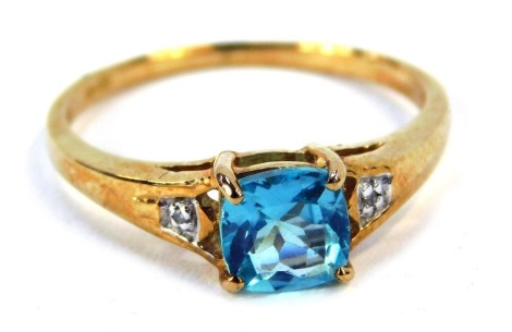 A 9ct gold apatite dress ring, with central apatite stone, flanked by tiny diamond set shoulders, with a Rocks & Co certificate of authenticity, ring size N½, 1.8g all in, boxed.