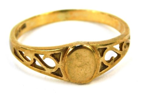 A 9ct gold dress ring, with vacant oval shield and scroll design shoulders, ring size J½, 1.4g all in.