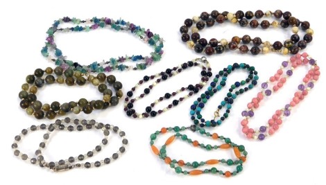 A group of semi precious stone set necklaces, to include jade, agate, amethyst, lapis lazuli, turquoise, and others, with yellow metal and white metal ball brakes and clasps, unmarked. (a quantity)