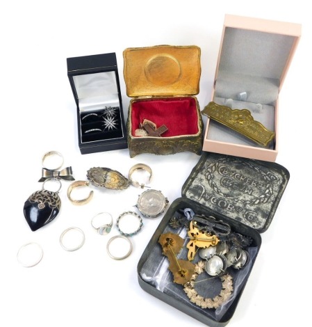 A small group of costume jewellery, to include four silver dress rings, a pair of diamante set drop earrings, Victorian brooches, coin bracelet, Limoges panelled trinket box, silver Victorian oval brooch, silver coin brooch, earrings, etc. (a quantity)