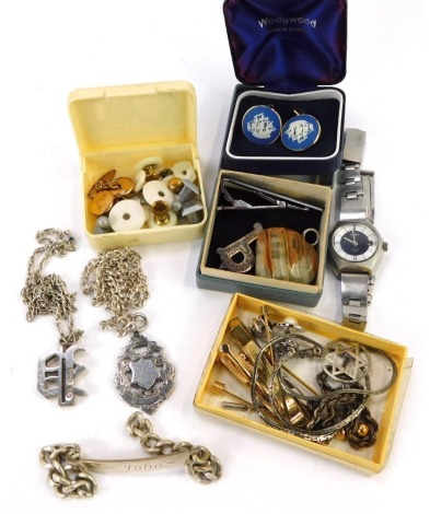 A group of jewellery and effects, to include a silver gilt tie clip, identity bracelets, necklaces, cuff links, etc. (a quantity)