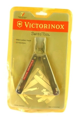 A Victorinox 21 Function Swiss tool, in plastic blister casing.