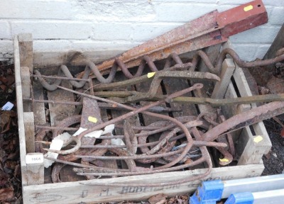 A group of metal wares, comprising fence post spikes, spirals, etc. (1 box)