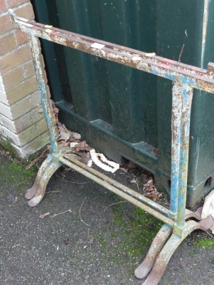 Two metal trestle stands.