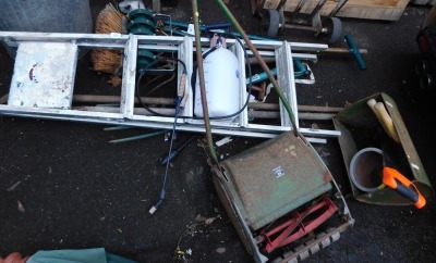 A quantity of tools, an aluminium step ladder, brushes, forks, push along mower, etc. (a quantity)