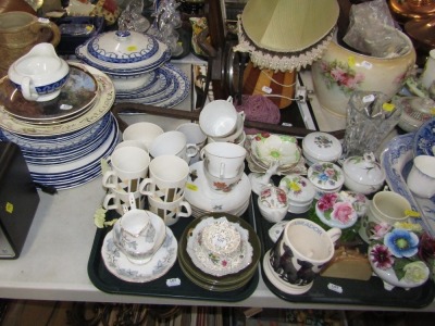 A carved onyx tabletop urn, blue and white plate, Ruark DAB radio, blue and white part tea service, cups and saucers, floral posy group, Carltonware pin dish, Emma Bridgewater Black Labrador mug, turned wooden lamp, rose bowl, barometers, etc. (2 trays an