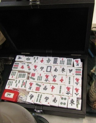 A cased Mah-Jong set.