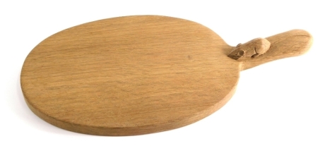 A Robert Thompson of Kilburn oak Mouseman oval cheese board, with carved mouse handle, 42cm long.