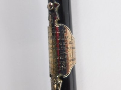 A Victorian ebonised baton, the tapering stem with pierced end and tip and band marked Presented to Wm Mould by the teachers and the JPM Sunday School Tyne .... As Token Of Respect 30th Sept 1874, unmarked, white metal, 53cm long, in outer case. - 3